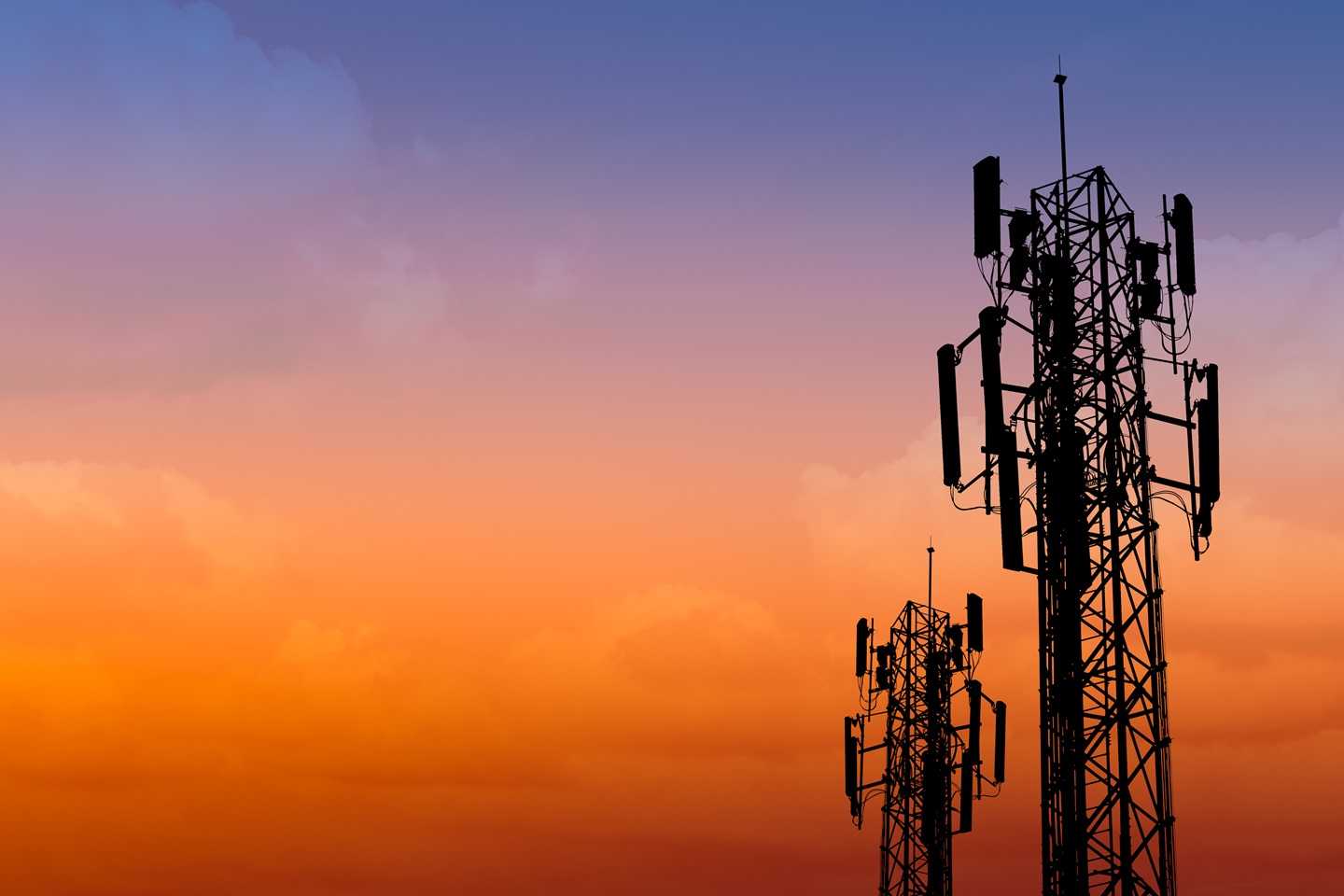 Telecommunications towers at sunset