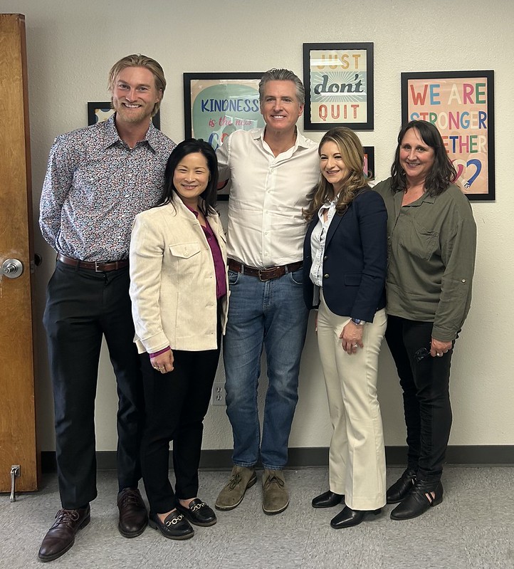 Commissioner Harada joined Governor Gavin Newsom, the California Department of Technology, and the Bishop Paiute Tribe to celebrate the tribe becoming the first customer of California’s Middle-Mile Network in April 2026. In photo (left to right): David Bath, CPUC Communications Division Analyst; Commissioner Harada; Governor Newsom; Ana Maria Johnson, CPUC Deputy Executive Director for Broadband and Communications; and Maria Kelly, CPUC Local Government and Community Liaison.