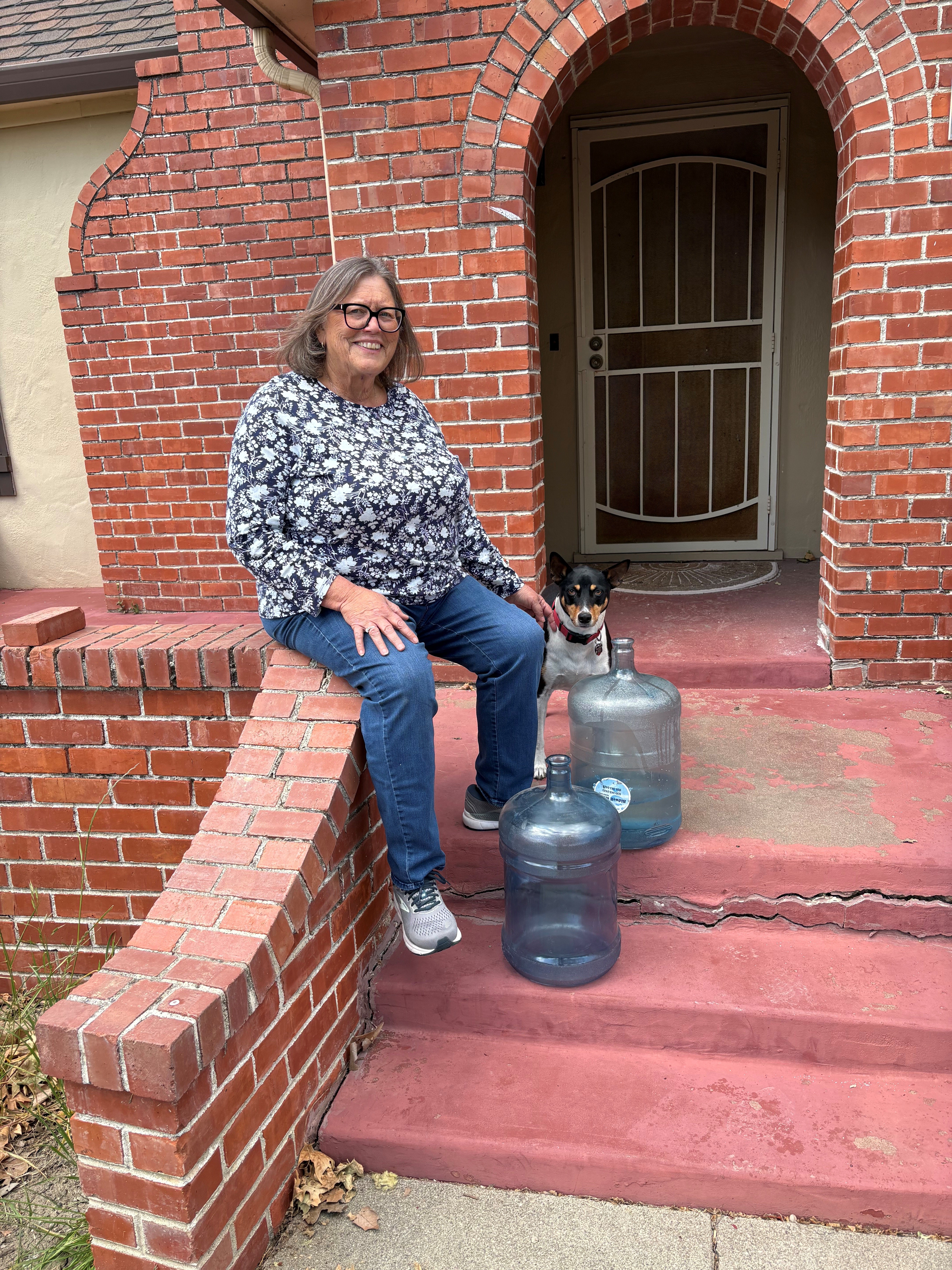 Bottled water is delivered to Joan Stephen's house in Robbins 