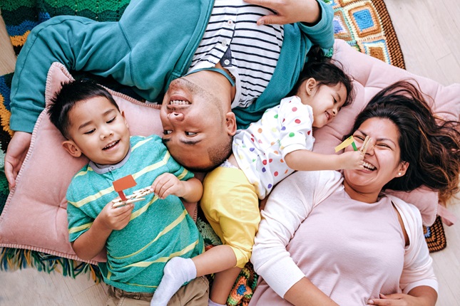 A family with small children enjoying time together 